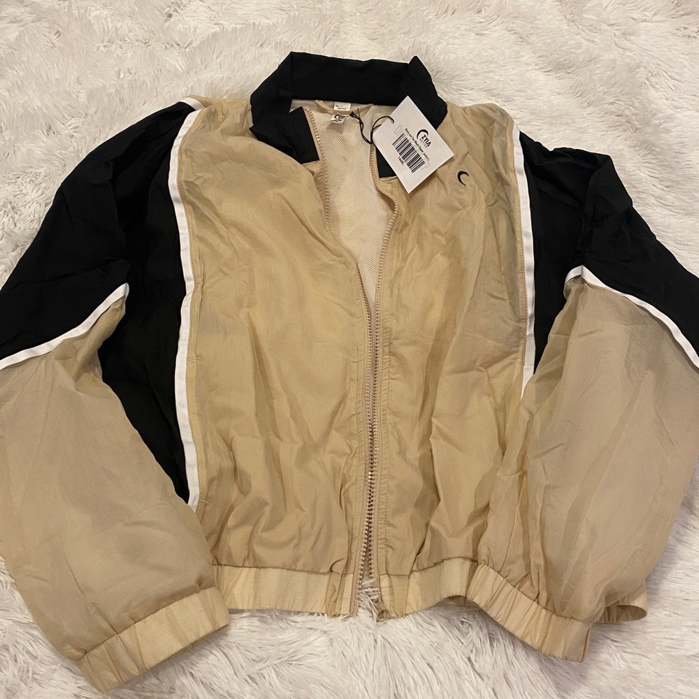 Zyia Tan and Black block zipper jacket